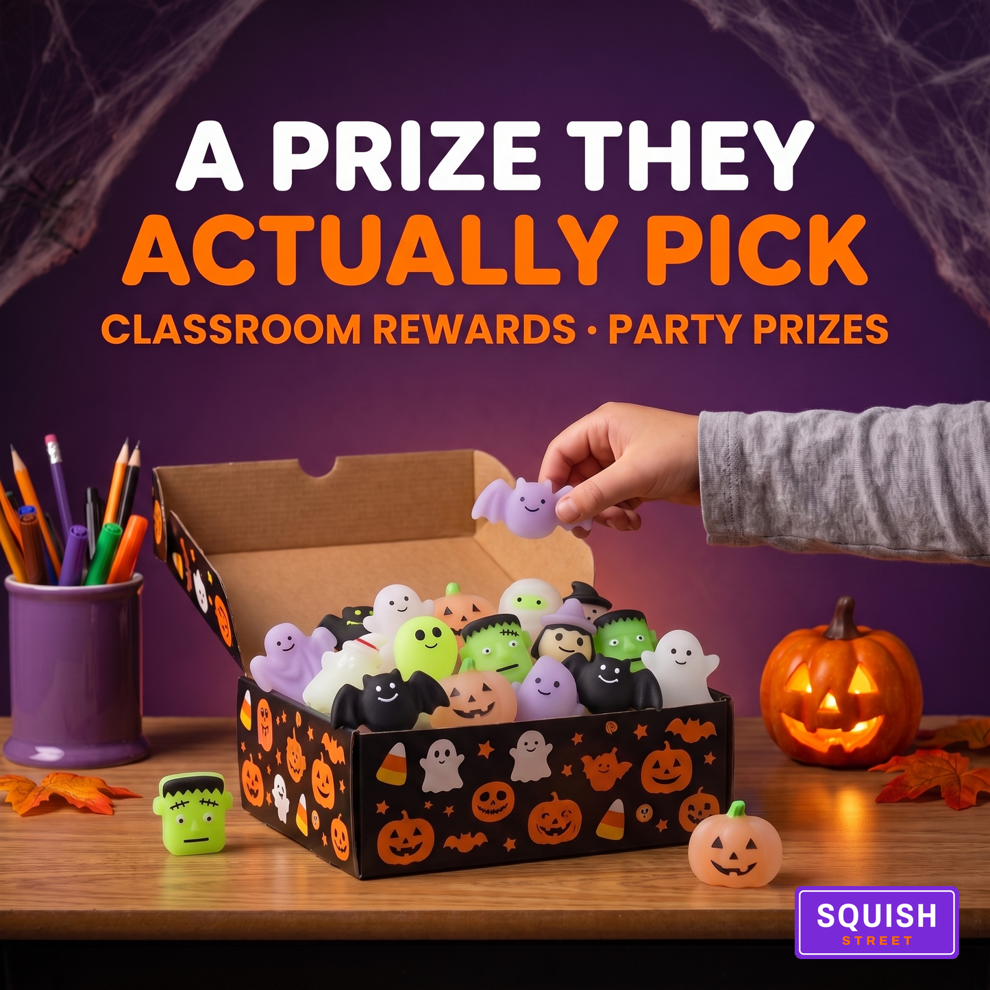 Classroom prize box full of Halloween squishies with a hand picking one out